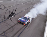 Experience the exhilaration of Denny Hamlin's historic victory burnout at the 2023 Pocono Win with the AUTOGRAPHED 8x10 Inch NASCAR Photo. This captivating image immortalizes the thrilling moment when Hamlin celebrated his triumph in a spectacular burnout. Our commitment to authenticity is unmatched; each signature is meticulously acquired through exclusive public/private signings and privileged garage access via HOT Passes. 