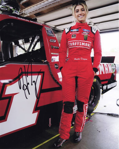 Get up close to the NASCAR action with the AUTOGRAPHED 2023 Haile Deegan #1 Craftsman Truck Series (Garage Area) 8x10 Inch NASCAR Photo. This exclusive collector's piece offers an insider's view of Haile Deegan's racing journey in the NASCAR Truck Series. Haile Deegan's signature, acquired through exclusive public/private signings and prized garage area access via HOT Passes.