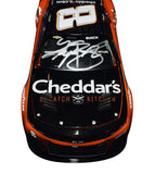 A close-up view of the AUTOGRAPHED 2023 Kyle Busch #8 Cheddar's Scratch Kitchen Camaro Diecast Car, showcasing the intricate details and Kyle Busch's authentic signature.