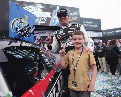 Experience the joyous NASCAR victory with an authentic Kyle Busch autographed 2023 McLaren Grills TALLADEGA WIN (Victory Lane with Son) 8x10 photo. This collector's gem, complete with a Certificate of Authenticity, captures not just triumph but the cherished father-son bond, a must-have for racing fans and collectors alike.