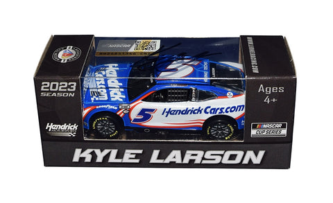 A detailed shot of the autographed 2023 Kyle Larson #5 Hendrick Cars Racing diecast car, proudly displayed on a sleek black stand alongside a Certificate of Authenticity, showcasing its exclusive nature and collector's value.