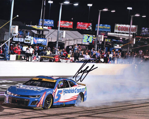 Experience the adrenaline rush of Kyle Larson's epic DARLINGTON WIN (Victory Burnout) with an autographed 2023 Kyle Larson #5 Hendrick Racing 8x10 Photo, capturing the spirit of NASCAR victory celebrations.