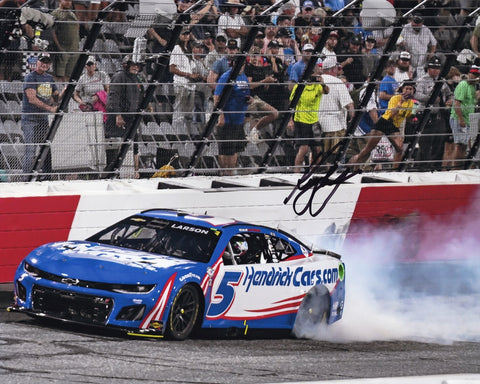 Experience the electrifying moment of Kyle Larson's historic North Wilkesboro Speedway ALL-STAR WIN (Victory Burnout) with an autographed 2023 Kyle Larson #5 Hendrick 8x10 Photo, capturing the euphoria of NASCAR's victory celebrations.