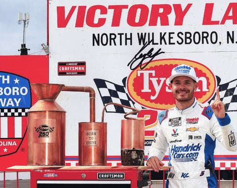 Exclusive signed NASCAR photo commemorating Kyle Larson's triumphant NORTH WILKESBORO WIN (Xfinity Series Trophy). Act quickly to own a piece of racing history with this unique collector's item!