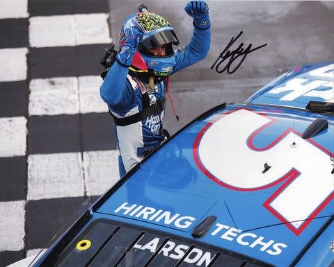 Exclusive signed NASCAR photo commemorating Kyle Larson's triumphant MARTINSVILLE WIN (Finish Line Celebration). Act quickly to own a piece of racing history with this unique collector's item!