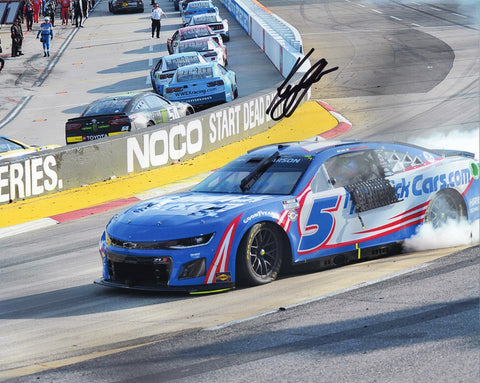 Experience the electrifying victory of Kyle Larson's historic MARTINSVILLE WIN (Victory Burnout) with an autographed 2023 Kyle Larson #5 Hendrick 8x10 Photo, capturing the thrill of NASCAR's triumphant moments.