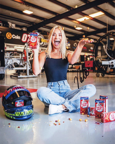 Authentic Natalie Decker #08 autographed NASCAR photo showcasing her performance at the Cracker Jill Racing Xfinity Series race in Charlotte.
