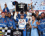 Own a piece of racing history with this authentic autographed 8x10 inch NASCAR photo of Ricky Stenhouse Jr. celebrating his Daytona 500 victory alongside the trophy. Certificate of Authenticity included.