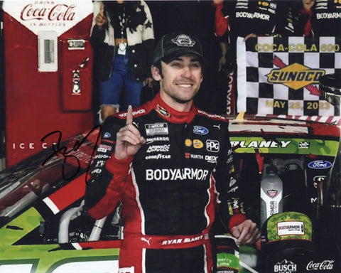 Authentic Ryan Blaney signature on glossy NASCAR photo, commemorating his memorable victory at Charlotte Motor Speedway's COCA-COLA 600.