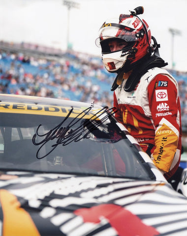 yler Reddick Signed NASCAR Glossy Photo featuring his autograph against the backdrop of the McDonald's Toyota HAMBURGLAR design, capturing the exhilarating essence of the Phoenix Raceway and the competitive spirit of 23XI Racing. Each signature is carefully obtained through exclusive signings and garage area access via HOT Passes, accompanied by a Certificate of Authenticity to guarantee its genuine nature. Don't miss your chance to own this unique piece of NASCAR history, as inventory is extremely limited.