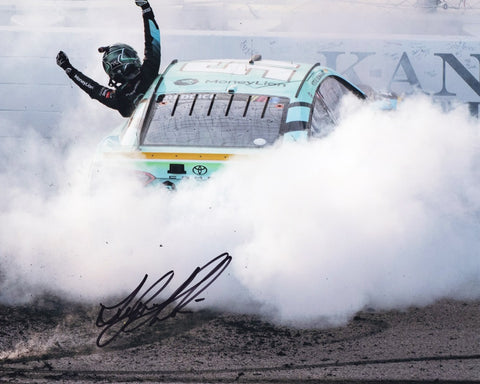 Autographed 2023 Tyler Reddick #45 Money Lion KANSAS WIN NASCAR Photo - Tyler Reddick performing a "No Hands Burnout" to celebrate victory, signed 8x10 inch photo from the Money Lion Team.