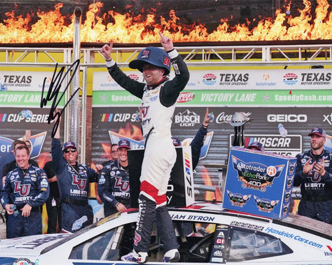 Immerse yourself in the thrill of victory with this exclusive collectible - an autographed 2023 William Byron #24 Liberty TEXAS RACE WIN NASCAR photo, capturing the fiery celebration of Victory Lane Fire. Each signature is meticulously obtained through sought-after public/private signings and garage area access via HOT Passes, ensuring unparalleled authenticity. 