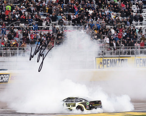 This autographed 2023 William Byron #24 Raptor Racing LAS VEGAS WIN NASCAR photo captures the electric moment as Byron executes a spectacular burnout celebration at Las Vegas Motor Speedway. Each signature is meticulously obtained through exclusive public/private signings and garage area access via HOT Passes, guaranteeing authenticity. 