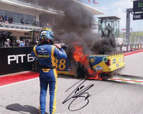 Add this authentic Zane Smith autographed 8x10 inch NASCAR photo to your collection, capturing his electrifying victory fire burnout at COTA. Authenticated signatures, Certificate of Authenticity, and 100% lifetime guarantee included.