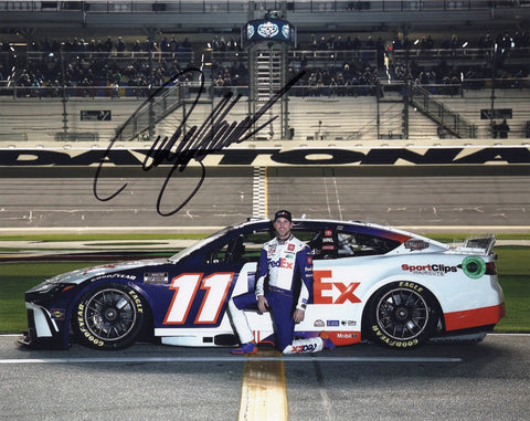 Experience the thrill of NASCAR with this autographed Denny Hamlin #11 FedEx Racing Daytona Speedway glossy photo.