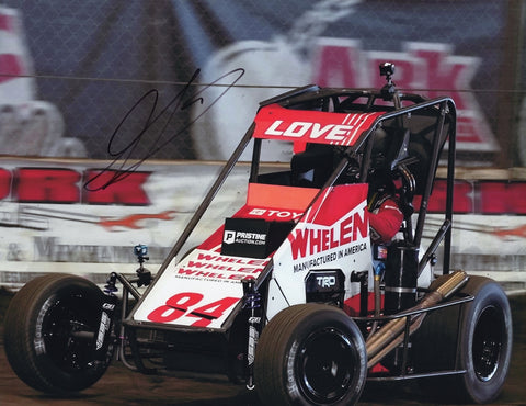 This autographed 2024 Jesse Love Chili Bowl Nationals photo captures the excitement of his sprint car racing performance. Signed by Love, the 9x11 glossy photo includes a Certificate of Authenticity (COA), ensuring it’s a genuine collector's item.