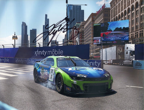 This autographed 2024 Kyle Busch #8 Zone Camaro Chicago Street Race photo features Busch racing on the unique urban course. Signed by Busch, the 9x11 inch glossy photo comes with a Certificate of Authenticity (COA). A great addition to any NASCAR collection and a perfect gift for fans.