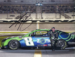 This autographed 2024 Kyle Busch #8 Zone Camaro Daytona 500 pit road photo features Busch in action during the prestigious race. Signed by Busch, the 9x11 inch glossy photo includes a Certificate of Authenticity (COA), ensuring its value and authenticity. It's an ideal addition to any NASCAR collection.