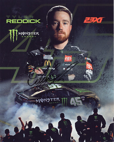 Tyler Reddick Signed 8x10 Inch Picture NASCAR Photo capturing the excitement of his victory burnout at COTA, signed on the #45 Monster Energy OFFICIAL HERO CARD. This limited-edition collectible is authenticated and comes with a COA.
