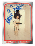 AUTOGRAPHED Carrie Fisher 1980 Star Wars Official Trading Card - Iconic Leia Takes Control scene, autographed by Carrie Fisher.