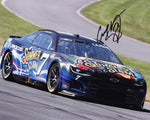 Experience the thrill of NASCAR and WWE with this autographed photo, and enjoy our 100% lifetime guarantee on authenticity.
