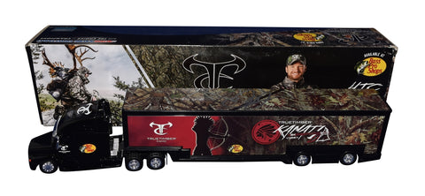 A close-up of the autographed Dale Earnhardt Jr. 2016 True Timber Camo NASCAR Hauler, showcasing the signature of the renowned driver.