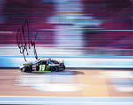 Experience the thrill of NASCAR with this autographed 8X10-inch glossy photo of Hailie Deegan in action at Phoenix Raceway, capturing her K&N Series race day triumph.