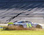 Capture the excitement of NASCAR's past with this autographed Jeff Gordon 2004 Talladega Race Win photo, a perfect gift for any racing fan.