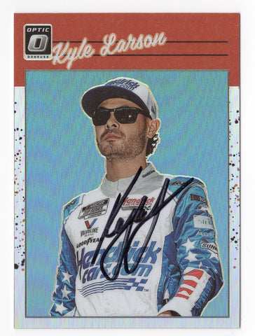 Rare autographed Kyle Larson 2023 Donruss Optic Retro Silver Prizm card featuring Larson's signature obtained through exclusive signings. A prized collectible for NASCAR fans.