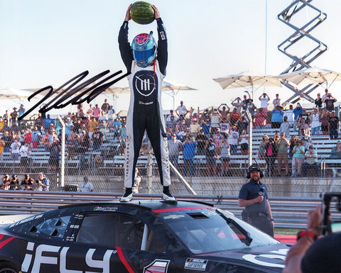 Immerse yourself in the world of NASCAR with an AUTOGRAPHED 2022 Ross Chastain #1 Trackhouse Racing COTA RACE WIN (Watermelon Smash) 1st Career Victory Signed 8X10 Inch Glossy Photo, capturing the iconic watermelon smash moment at Circuit of the Americas.