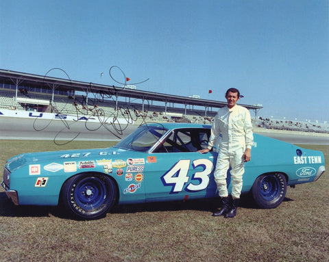 Autographed 8x10 glossy photo of Richard Petty’s 1969 #43 Ford Torino at Daytona 500, showcasing a rare moment in his NASCAR career and racing history.
