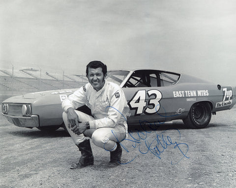 Autographed 8x10 photo of Richard Petty in his #43 Ford Torino during the 1969 Riverside California race, highlighting a rare season with East Tenn Motors.