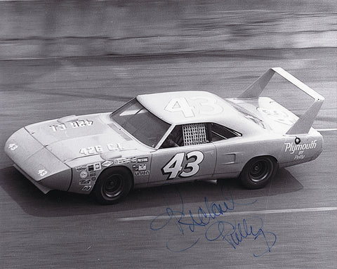 Authentic 1970 Richard Petty #43 STP Racing Plymouth Superbird 8x10 glossy photo, signed by the legendary driver. Complete with a Certificate of Authenticity (COA), this rare piece makes an amazing gift for NASCAR fans or collectors and is guaranteed authentic.