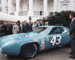 Rare autographed 1971 Richard Petty #43 STP Racing 8x10 photo, capturing Petty’s visit to the White House after securing the 1971 Winston Cup Championship. The photo, signed by Richard Petty and accompanied by a COA, makes an unforgettable gift for any NASCAR enthusiast or collector.