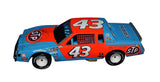 Detailed view of the 1981 Richard Petty #43 STP Racing diecast car, signed by Richard Petty. Limited to 708 pieces, featuring a Certificate of Authenticity and a lifetime authenticity guarantee. Perfect for any NASCAR memorabilia collection.