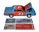Side view of the autographed Richard Petty #43 STP Racing North Wilkesboro Win diecast car. Limited edition of 708, includes exclusive signing details, a Certificate of Authenticity, and a lifetime authenticity guarantee. A great gift for racing enthusiasts.