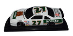 Signed 1989 Rusty Wallace #27 Kodiak Winston Cup Champion diecast car with black window bank design. One of only 6,210 produced, includes COA and lifetime authenticity guarantee. A great gift for NASCAR fans.