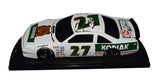 Signed 1989 Rusty Wallace #27 Kodiak Winston Cup Champion diecast car with black window bank design. One of only 6,210 produced, includes COA and lifetime authenticity guarantee. A great gift for NASCAR fans.