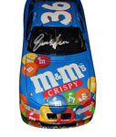 1999 Ernie Irvan #36 M&M's Crispy Racing diecast car, signed by Ernie Irvan. This collectible includes a Certificate of Authenticity and a lifetime authenticity guarantee. Perfect for any NASCAR memorabilia collection.