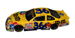 The 1999 Ernie Irvan #36 M&M's Racing Millennium Countdown diecast car, featuring Ernie Irvan's signature obtained through exclusive public and private signings. Comes with a Certificate of Authenticity and a lifetime authenticity guarantee.