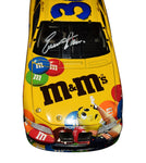 1999 Ernie Irvan #36 M&M's Racing Millennium Countdown diecast car, signed by Ernie Irvan. This collectible includes a Certificate of Authenticity and a lifetime authenticity guarantee. Perfect for any NASCAR memorabilia collection.
