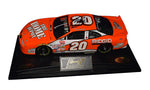 1/24 scale autographed 1999 Tony Stewart #20 Home Depot Rookie of the Year diecast, celebrating his impressive rookie season. Includes COA and lifetime authenticity guarantee.