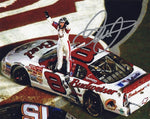 Autographed 8x10 glossy photo of Dale Earnhardt Jr. celebrating his 2001 Daytona race win in the #8 Budweiser car, featuring a tribute to Dale Earnhardt Sr. Includes COA, perfect for NASCAR fans and collectors.