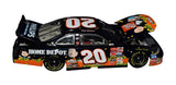 Rare autographed 2002 Tony Stewart #20 Home Depot “Search for the Great Pumpkin” NASCAR diecast car. Limited edition, with COA and lifetime authenticity guarantee—ideal for fans and collectors.
