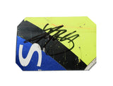 The 2006 Kyle Busch #5 Lowe’s Racing race-used sheet metal, autographed by Kyle Busch, features a unique 4-color piece. Perfect for any NASCAR fan, the sheet metal fits inside a plastic toploader for display, complete with COA.