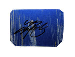 A rare signed piece of the 2006 Kyle Busch #5 Lowe’s Racing race-used sheet metal featuring a blue piece. The collectible fits inside a plastic toploader for display, making it the perfect gift for any NASCAR fan, with COA for authenticity.