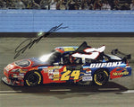 Autographed photo of Jeff Gordon celebrating his 76th NASCAR win at Phoenix Raceway, tying Dale Earnhardt's career total. Great tribute collectible for racing fans.