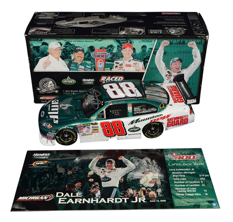 A close-up shot of the autographed 2008 Dale Earnhardt Jr. #88 AMP Racing Michigan Win diecast, featuring the raced version details. This signed 1/24 scale diecast is part of a limited edition of only 5,606, making it a must-have for NASCAR collectors and fans.