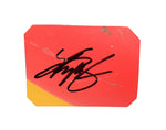 A signed 2008 Kyle Busch #18 M&M’s Racing race-used sheet metal featuring a red 2-color piece from the Daytona 500 car. This rare NASCAR collectible comes with COA and fits in a plastic toploader for easy display, making it a perfect gift for racing fans.