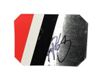 A detailed view of the 2008 Kyle Busch #18 M&M’s Racing race-used sheet metal with a 4-color piece from the Daytona 500. This rare NASCAR collectible fits in a plastic toploader for easy display and comes with a COA, making it a great gift for racing fans.